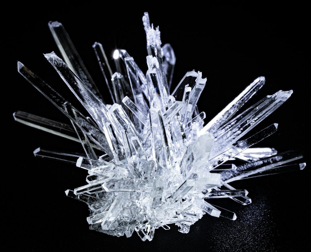 Clear quartz crystals arranged as part of a modern crystal collection